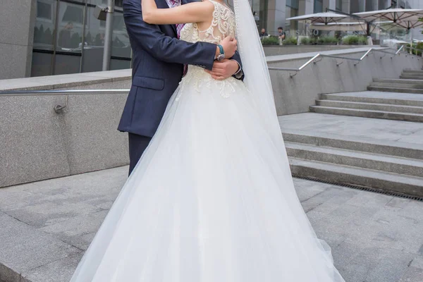 Bride and groom are standing near the stairs — Stock Photo, Image