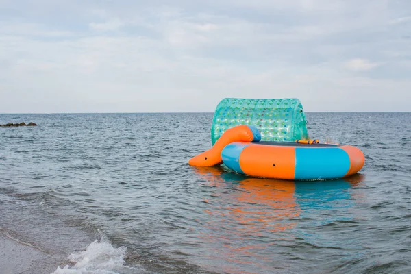 a trampoline on the water at sea