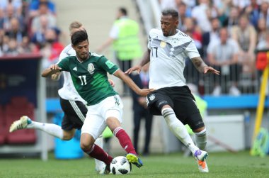 17.06.2018. Moskova, Rusya: Almanya v Meksika Moskova'da Lujniki Stadyumu arasında Vela ve Boateng eylem sırasında futbol FIFA Dünya Kupası Rusya 2018, F grubu eşleme.