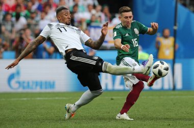 17.06.2018. Moskova, Rusya: Almanya v Meksika Moskova'da Lujniki Stadyumu arasında Boateng ve Herrera eylem sırasında futbol FIFA Dünya Kupası Rusya 2018, F grubu eşleme.