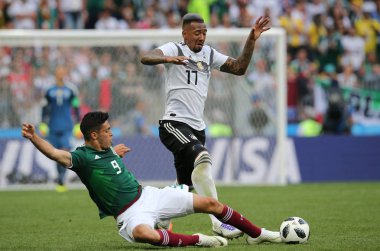 17.06.2018. Moskova, Rusya: Almanya v Meksika Moskova'da Lujniki Stadyumu arasında Boateng ve Jimenez eylem sırasında futbol FIFA Dünya Kupası Rusya 2018, F grubu eşleme.