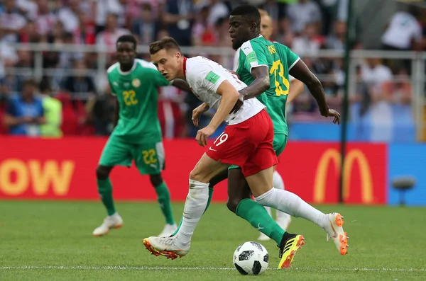 Moskova, Rusya - 19th Haziran 2018: Piotr Zielinski, Alfred N'Diaye eylem sırasında FIFA Dünya Kupası Rusya 2018, H Grubu, futbol Polonya vs Senegal Spartak Stadium Moskova arasında eşleme