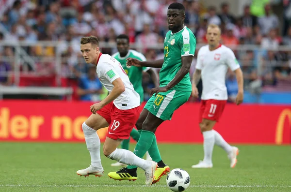 Moskova, Rusya - 19th Haziran 2018: Piotr Zielinski, Alfred N'Diaye eylem sırasında FIFA Dünya Kupası Rusya 2018, H Grubu, futbol Polonya vs Senegal Spartak Stadium Moskova arasında eşleme