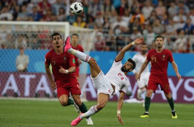 25.06.2018. Saransk, Rusça: Rmani Rezaeian eylem FIFA Dünya Kupası Rusya 2018, B grubu, futbol sırasında Iran V Portekiz Mordovia Saransk Arena Stadyumu arasında eşleme.