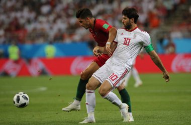 25.06.2018. Saransk, Rusça: Karim Ansarifard eylem FIFA Dünya Kupası Rusya 2018, B grubu, futbol sırasında Iran V Portekiz Mordovia Saransk Arena Stadyumu arasında eşleme.