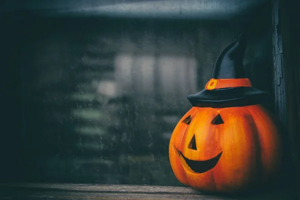 Halloween tök sötét ablak üveg háttér — Stock Fotó