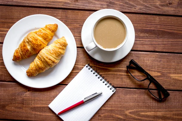 Business breakfast with coffee and croussant top view — Stock Photo, Image