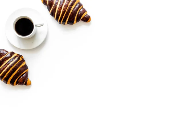 Coffee and croissants on white background top view — Stock Photo, Image