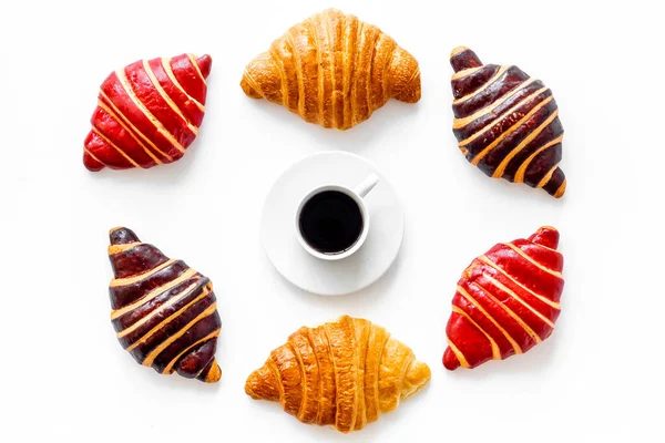 Coffee and croissants on white background top view — Stock Photo, Image