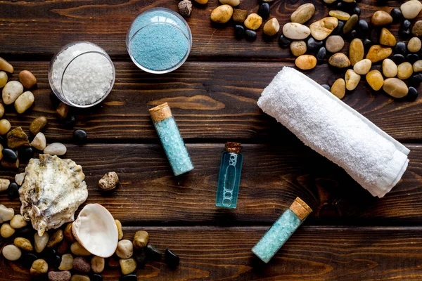 Spa set bar of sea cosmetics - aroma oil and blue salt. Above view — Stock Photo, Image