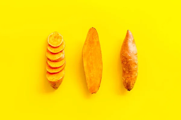 Muster mit Süßkartoffeln - Süßkartoffeln. Hintergrund Bio-Gemüse, Blick über den Kopf — Stockfoto