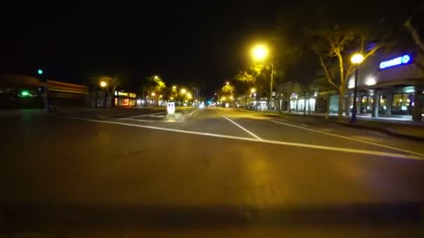 驾驶车牌洛杉矶夜景9西好莱坞圣莫妮卡大道西行进入比佛利山庄 — 图库视频影像