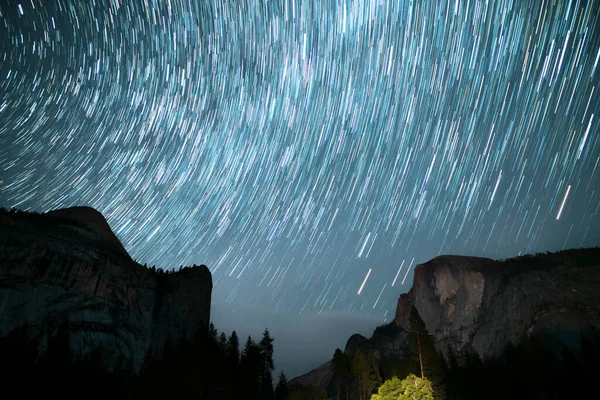 Yosemite Star Trails Over Half Dome and Royal Arch Astrophotography Night Sky in California USA