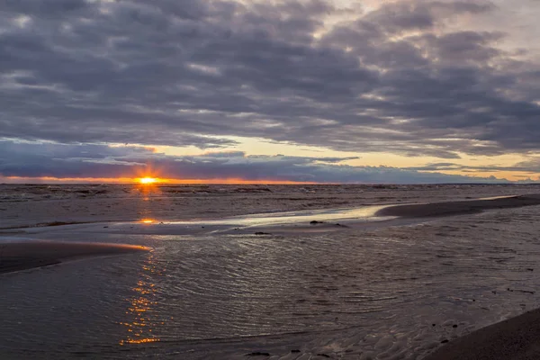 Colorful the sea sunset with  orange-violet paints