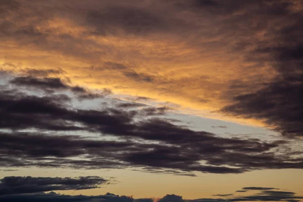 Colorful the sea sunset with  orange-violet paints