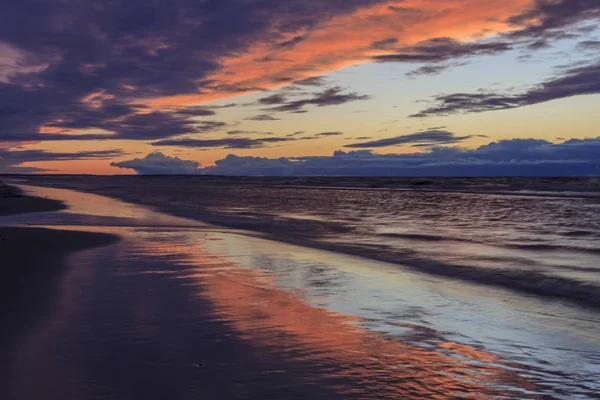 Colorful the sea sunset with  orange-violet paints