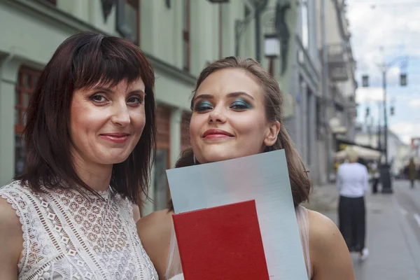 Happy mother with daughter. Graduate School Moscow Art Theater, actress Mitroshina Alena. The document is written in Russian: \