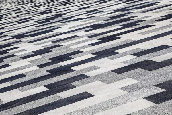 Fundo de lajes de pavimentação, listras pretas e brancas na diagonal — Fotografia de Stock