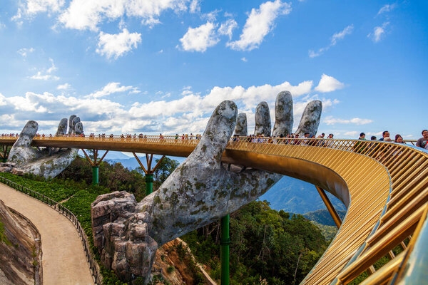 Danang, Vietnam- june 27, 2019:The Golden Bridge  tourist resort on Ba Na Hill in Danang, Vietnam. 