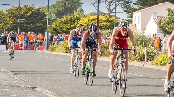 Saint Gilles Croix de Vie, France - September 10, 2016 : Final triathlon championship of France in the category D3 - cyclists straight for a road bike race