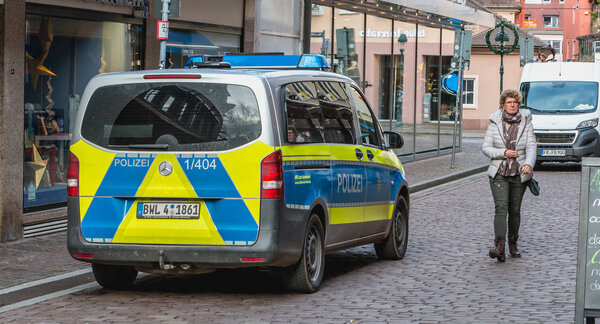 Freiburg im Breisgau, Germany - December 31, 2017: close up of a German police car parked in a street on a winter day