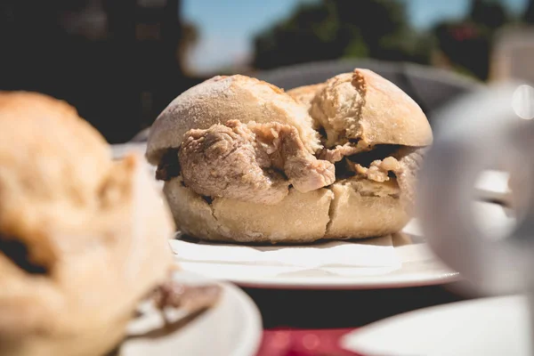 view of traditional portuguese pork beef sandwich bifana