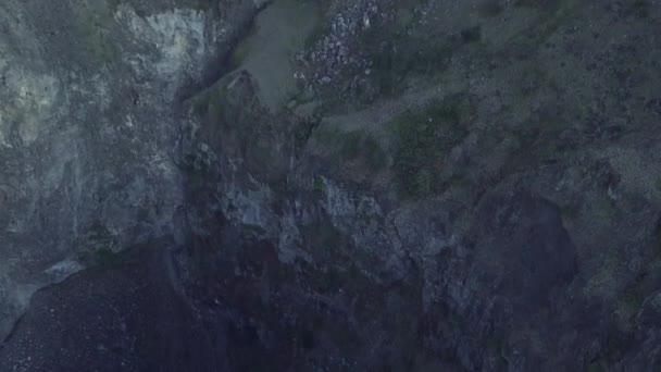 Top down view of a deep hole with rocks landslides caused by an earthquake. — Stock Video