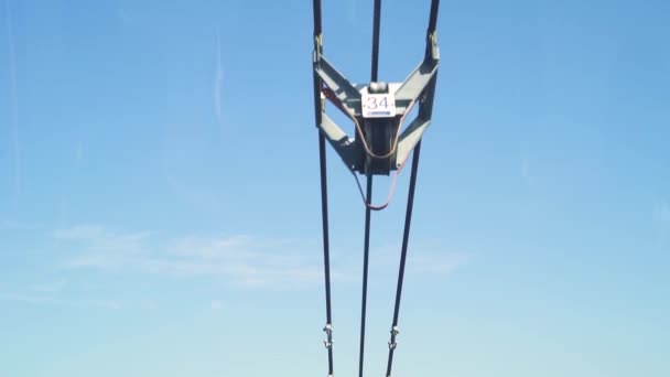 Aerial view of aerial tramway with scenic view of ocean and isalnd — Stock Video