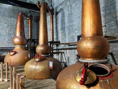 Stills used in the making of bourbon located in Kentucky. clipart