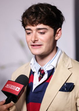 Kanadalı-Amerikalı aktör ve girişimci Noah Schnapp, 9 Eylül 2025 'te Hollywood, Los Angeles, Kaliforniya, ABD' de The Lot 'ta düzenlenen 30. Yıldönümü Süt Bıyığı Kutlamasına geldi..      