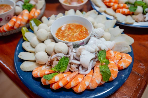steamed seafood, Fish ball, squid, shrimp served with spicy sauc