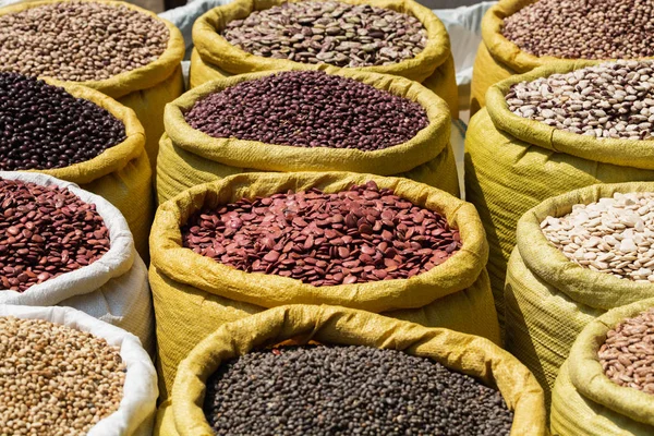 Different kinds of legumes beans in bulk bags on the market in Yangon, Myanmar