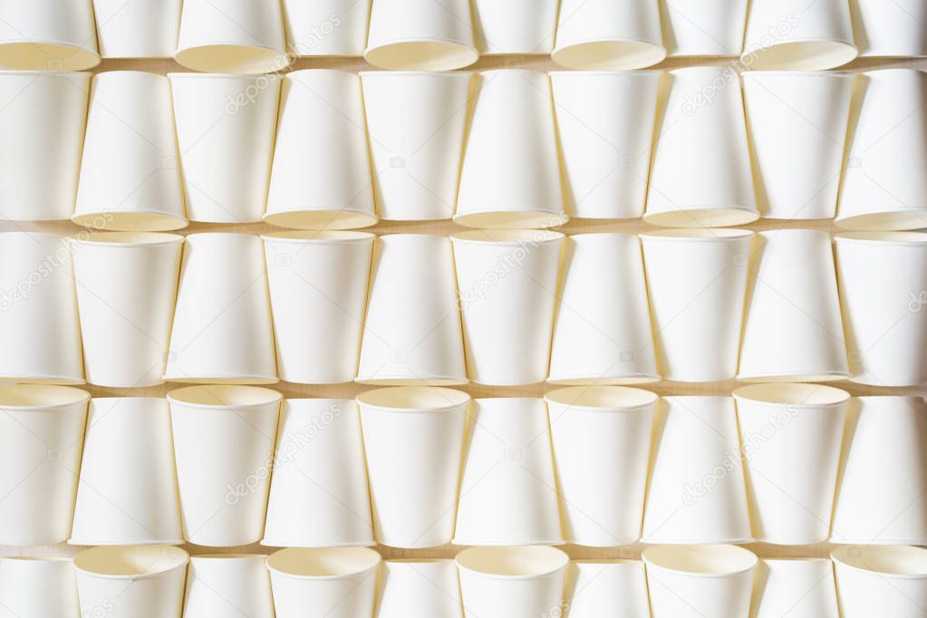Background pattern of empty white paper cups