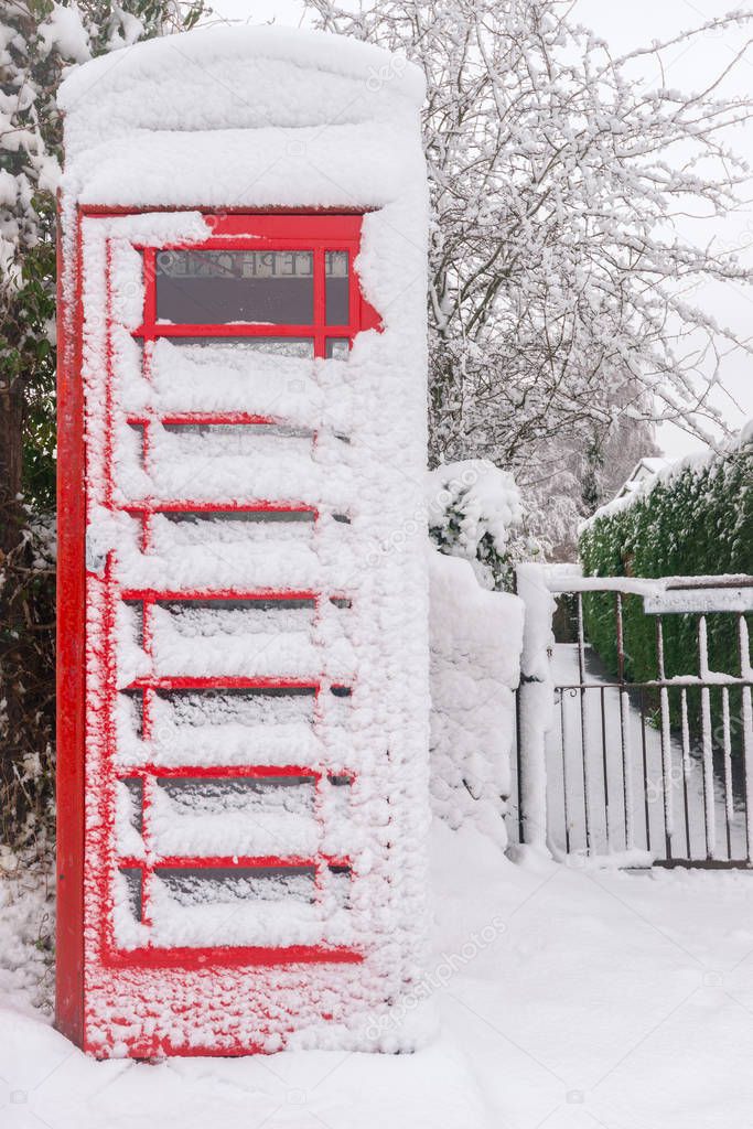 Snow covered phonebooth