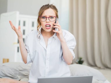 Surprised woman, astonished woman with shocked face and open mouth holding phone. Scream clipart