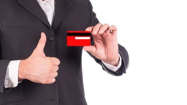 Homem de terno preto segurando cartão vermelho isolado no branco. Cores de ano novo de cartão — Fotografia de Stock