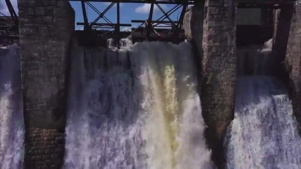 Aerial view. Shot of Waterfall and an Old Dam. Summer landscape. The camera moves from the left to right — Stock Video