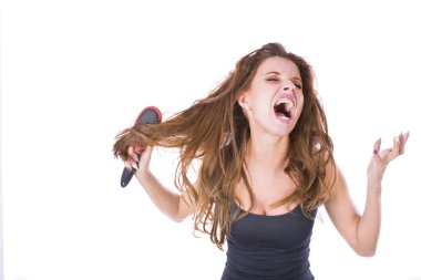 Having problem saç ise genç güzel kız. İzole studio vurdu