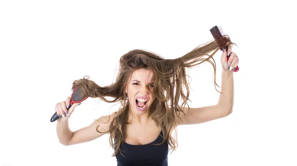 Young beautiful girl having problems while hair. Isolated studio shot — Stock Photo, Image