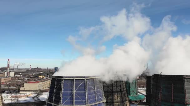 Industrial smoke stack pipes pollute air with toxic emissions. Ecology problem. Huge smoking factory chimneys in winter. Thermal power station. Environmental concept. — Stock Video