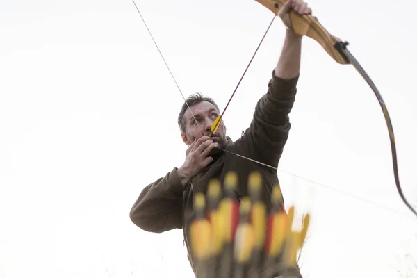 Archery. Man with a bow. Cropped image. — Stock Photo, Image