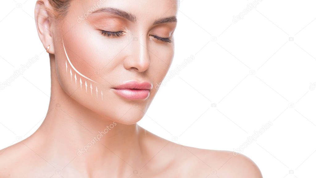 Woman portrait close up. Beautiful woman with lifting arrow on face over white background.
