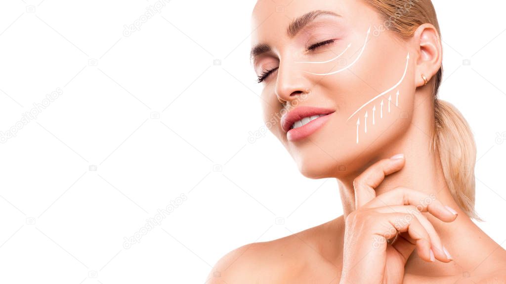 Woman touching her face on white background. Close up portrait.