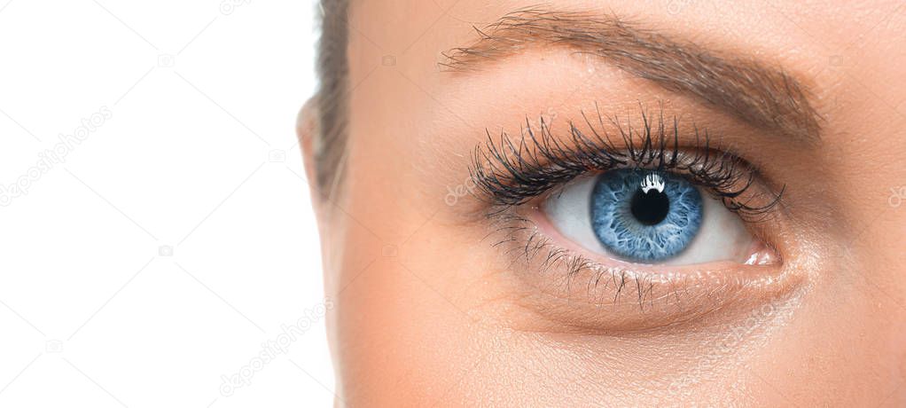 Close up view of an eye of a woman.