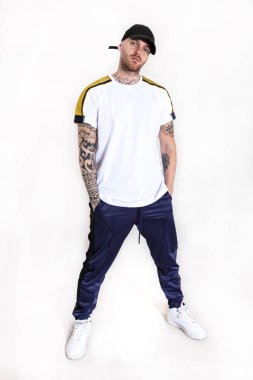 portrait of young rapper in the studio on a white background clipart