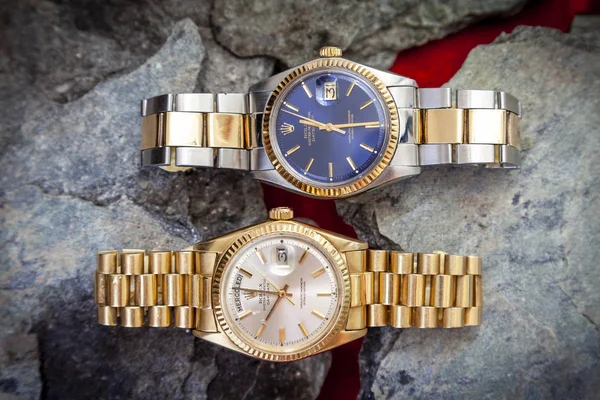 Rolex Oyster Perpetual Day- Date and Oyster Blue watch on rocks — Stock Photo, Image