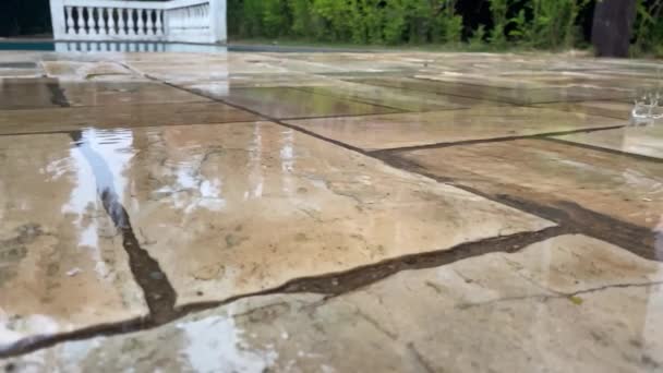 Slow Motion Rain Drops Falling Sky Stone Floor Pool Shot — Stock Video