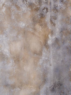 Çatlaklar ve lekeler cilalanmış beton duvarın yüzeyinde