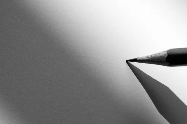 Crayon Tenant Écrire Sur Papier Dans Ombre — Photo
