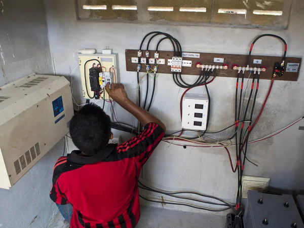 Countryside Electrician Maintenance Battery Bank System Stock Picture